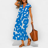 Loose-fitting dress with a V-neckline and modern design