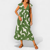 Loose-fitting dress with a V-neckline and modern design