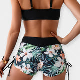 Aukšto liemens bikinis su atogrąžų raštais