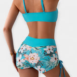 Aukšto liemens bikinis su atogrąžų raštais