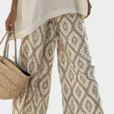 Boho Chic ramunėlių komplektas: ilgas viršus ir raštuotos kelnės unikaliam stiliui