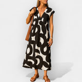 Loose-fitting dress with a V-neckline and modern design