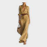 Erdvi suknelė, pasižyminti nesenstanti elegancija