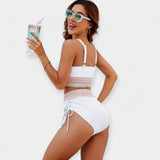 Aukštu liemeniu bikinis su pakietinimais