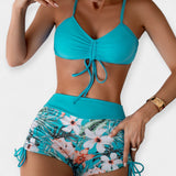 Aukšto liemens bikinis su atogrąžų raštais