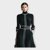 Ilga suknelė su minimalistine elegancija
