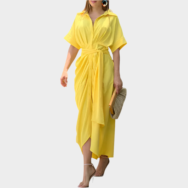 Suknelė pūsta apykakle ir elegantiška linija