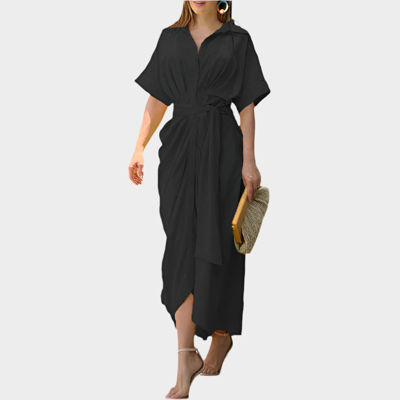 Suknelė pūsta apykakle ir elegantiška linija