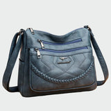 Elegantiška odinė rankinė per petį