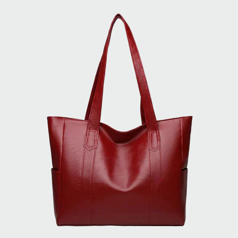 Elegantiška rankinė per petį